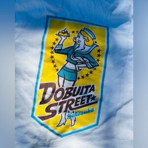 White Dobuita Street Graphic T-Shirt from Japan’s famed  nostalgic street